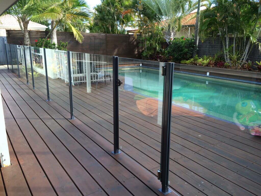 semi frameless glass pool fence on wooden deck