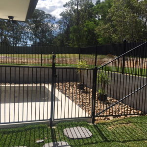 Custom black flat top pool panel fence