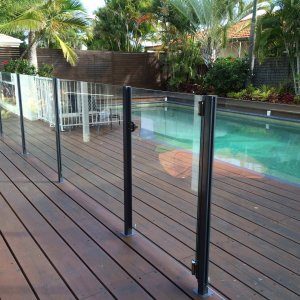 semi frameless glass pool fence on wooden deck